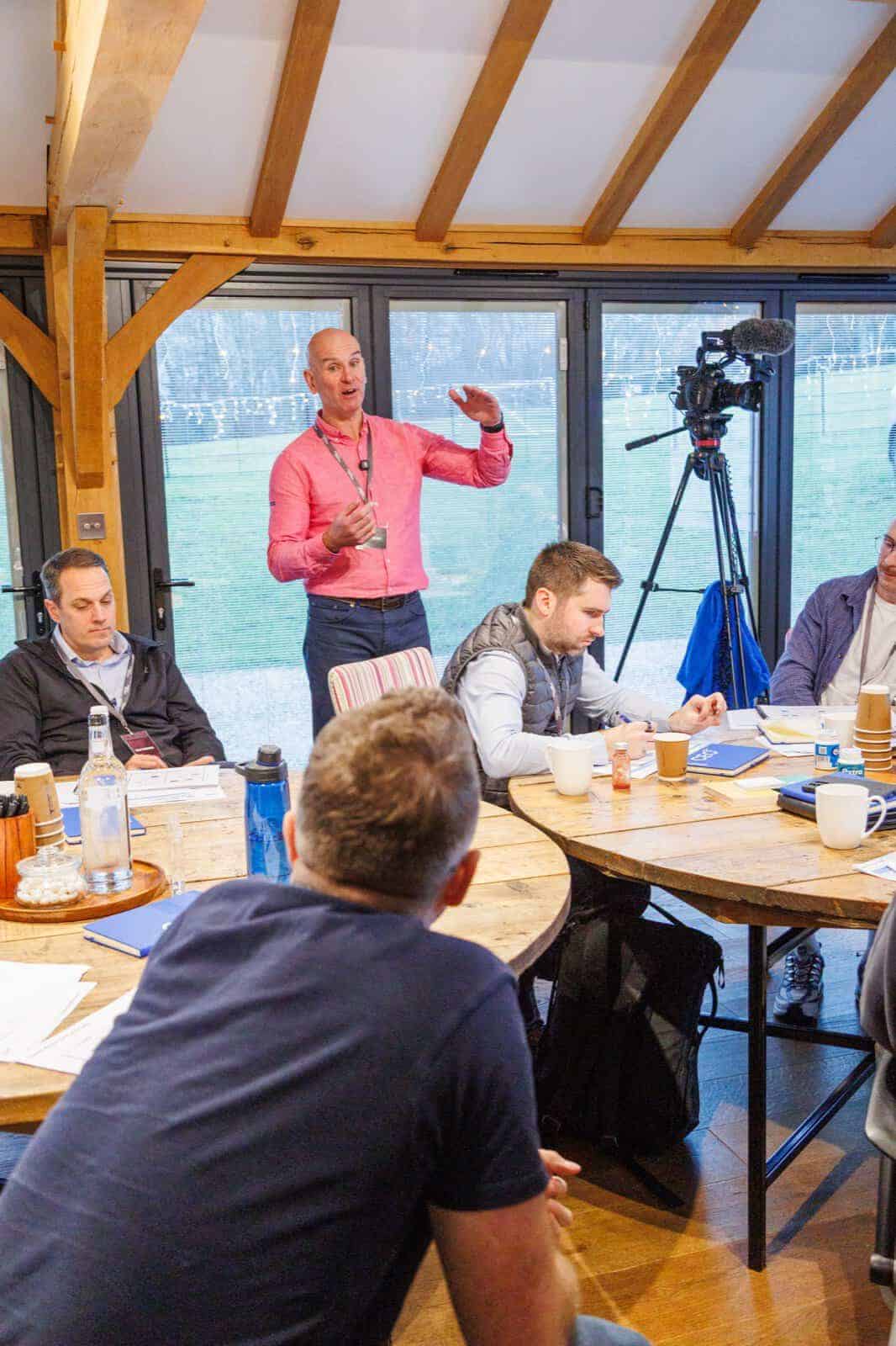 Dominic Monkhouse coaching founders through an attribution mapping exercise.