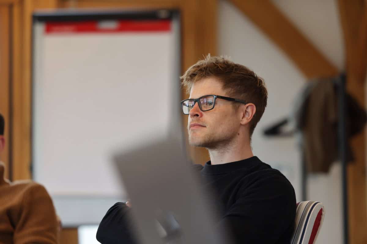 Business professional engaged during a Rockefeller Habits coaching workshop