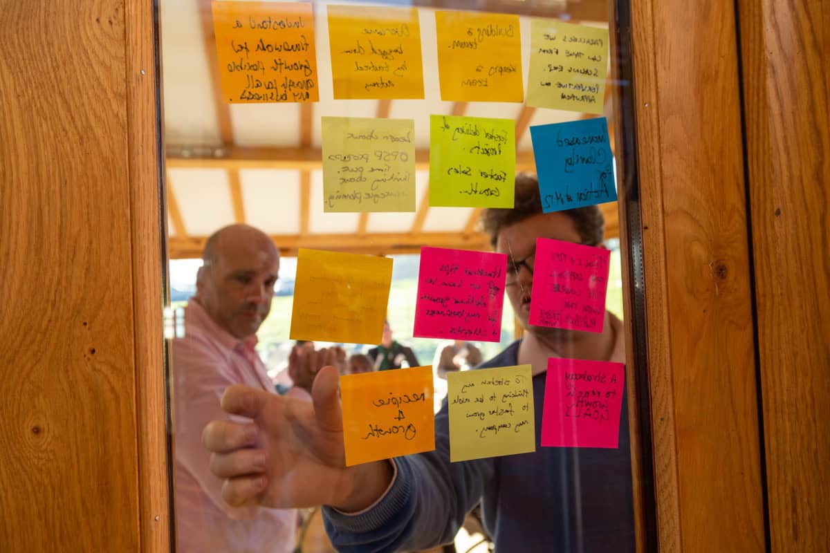 Founder-CEOs at a Monkhouse & Company scale-up cohort working through how to hold the hiring bar as a company grows past 100 people.