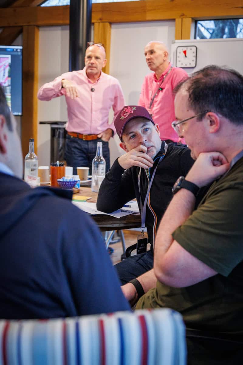 Founder-CEOs listening during a Monkhouse and Company roundtable session.