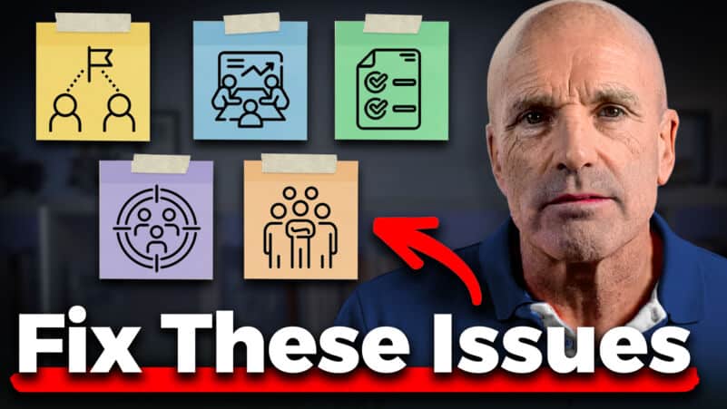 Businessman with sticky notes highlighting key issues and solutions.