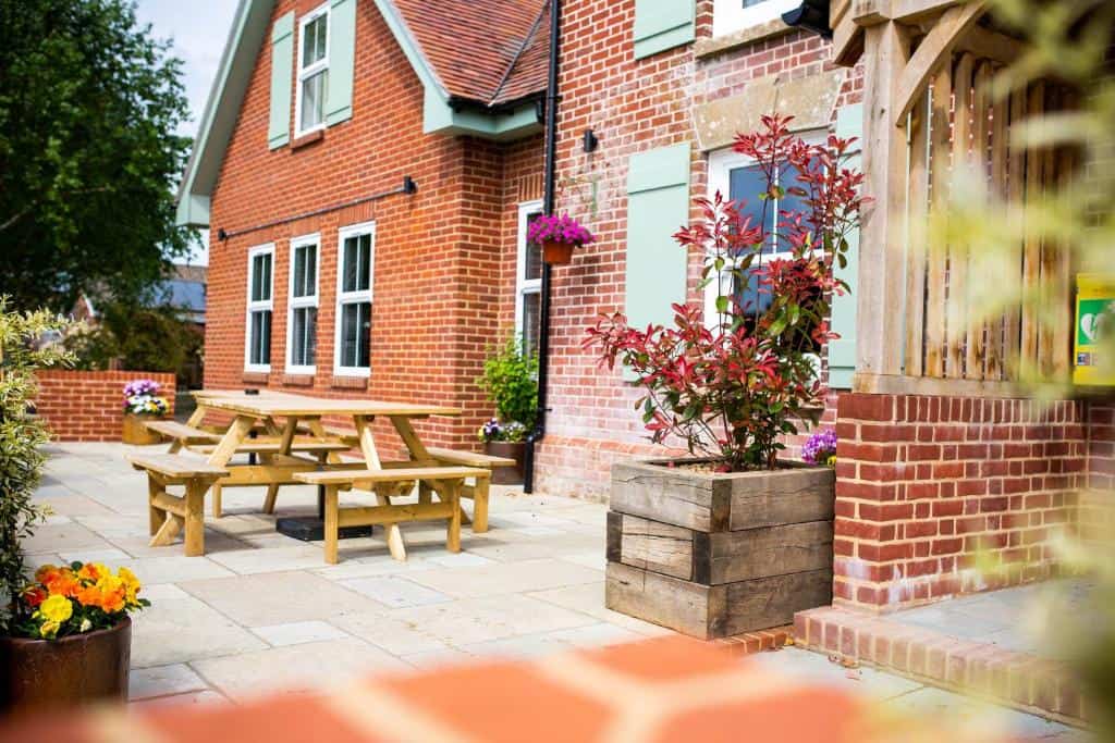The Woodfalls Inn interior and grounds
